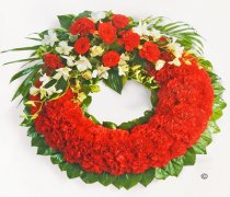 Red Carnation Wreath Code: JGFF2960RCW | Local Delivery Or Collect From Shop Only