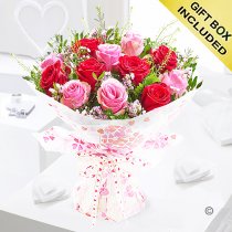 Valentine's 12 raspberry pink hugs and kisses Code: JGFV42412PR | Local delivery or collect from our shop only