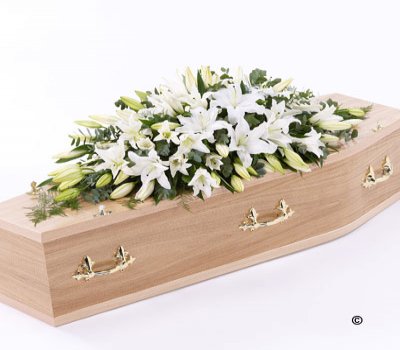 White Oriental Lily Casket Spray Code: F13530WS  | National and Local Delivery