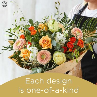 Lily Free Florists Choice Hand tied bouquet made with seasonal flowers Code: LFHT7S | National Delivery and Local Delivery Or Collect From Shop