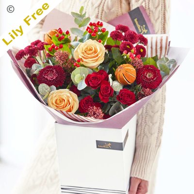 Bespoke Classic Christmas lily free hand tied bouquet Code: XCLFHT0200 | National delivery and local delivery or collect from shop