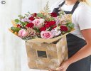 Lily Free Florists Choice Hand tied bouquet made with seasonal flowers Code: LFHT5 | National / local delivery or collect from shop