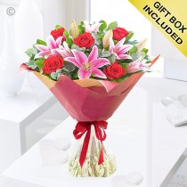 Crimson red rose and pink lily handtied Code: JGFV30006CRLB | Local delivery or collect from shop only